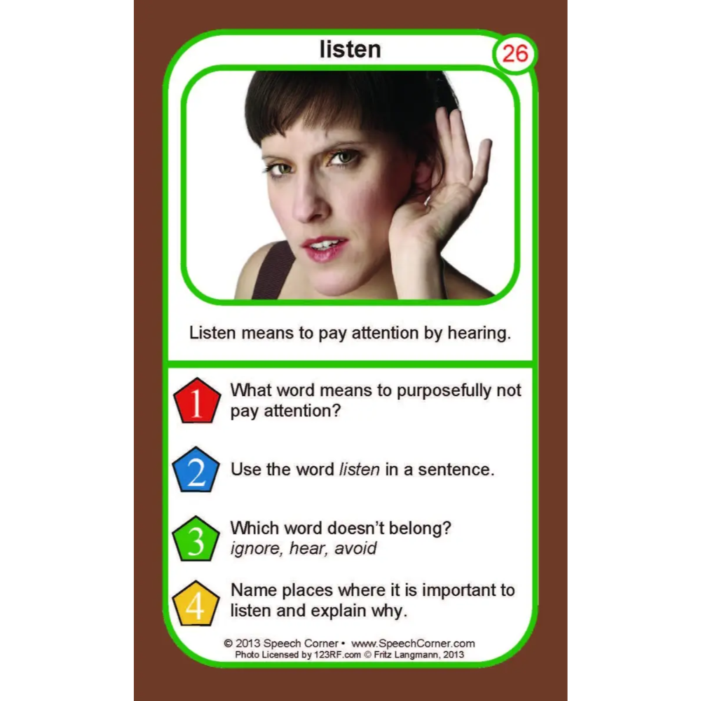 A printed educational card titled 'listen' with a photo of a woman at the top, a green border, and text explaining the meaning of the word along with four numbered example questions. The card is centered on a brown background with white side margins.