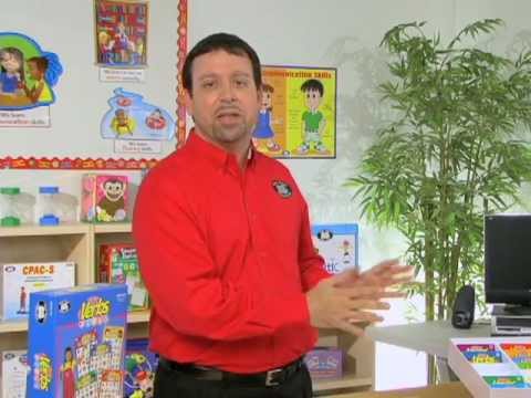 Speech-Language Pathologist (SLP) explaining how to use Say & Do® Verbs Bingo, a grammar and language development game for students and children