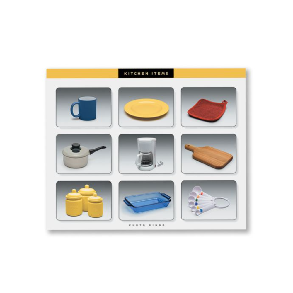 Set of kitchen items including a mug, plate, cutting board, pot, coffee maker, cutting board, canisters, and measuring cups on a white background.