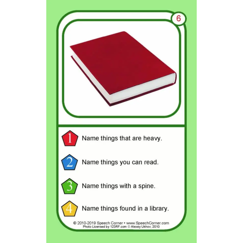 A speech therapy card featuring a red hardcover book in a green-bordered frame, with numbered prompts below asking children to name heavy things, readable things, spiny things, and library things.