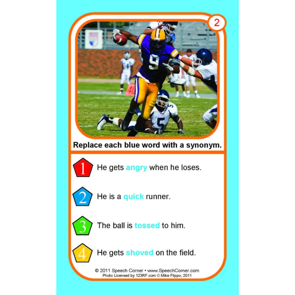A printed educational card with a football photo at the top and text exercises below, including the instruction 'Replace each blue word with a synonym.' The card is shown centered on a light aqua background.