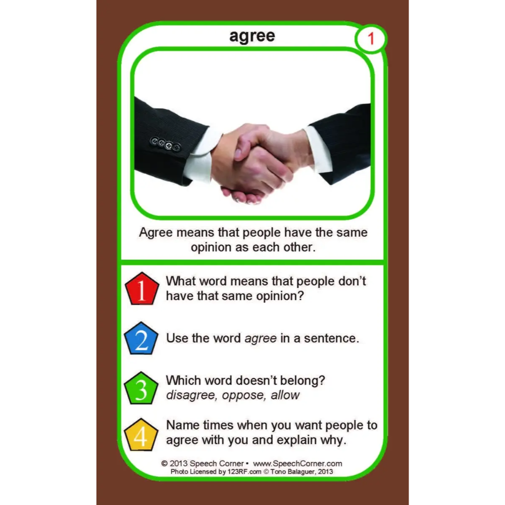 A printed educational card titled 'agree' with a handshake photo at the top and four numbered learning questions below, shown on a brown background.