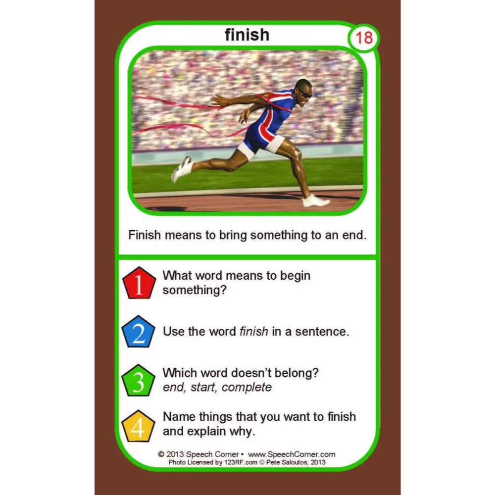 A printed educational card titled "finish" with a photo of a runner crossing a race finish line, plus text defining the word and four learning prompts on a white card with a green border over a brown background.