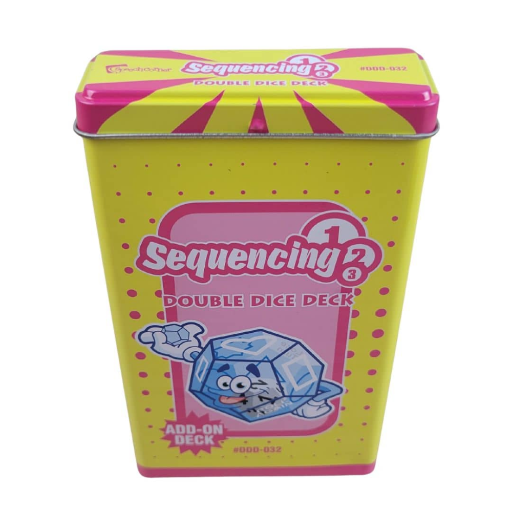 A yellow and pink metal tin of the Sequencing Double Dice Deck add-on, featuring a cartoon ice cube character on the front, set against a plain white background.
