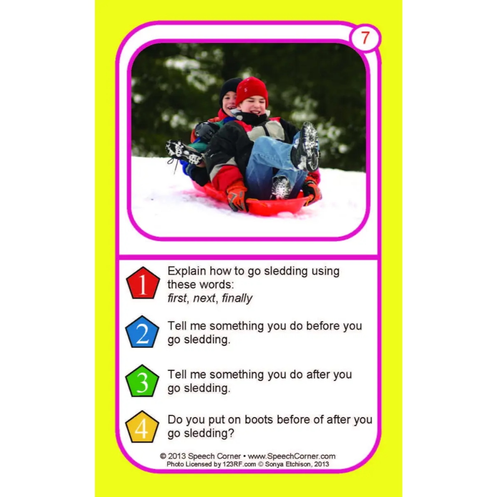A children's educational speech practice card featuring a photo of two children sledding in the snow, with four numbered questions about sledding written below on a bright yellow card with a pink border.