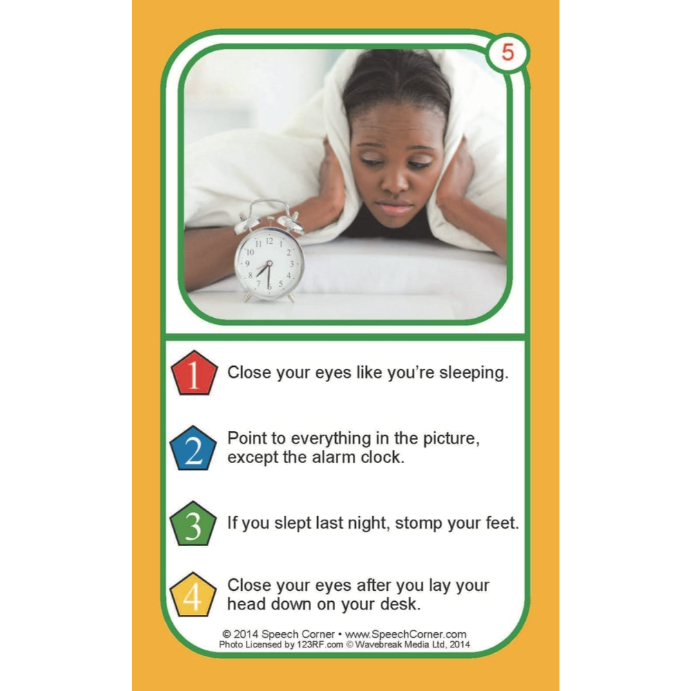 A printed sleep-habits card with a photo of a person lying under a blanket and holding an alarm, plus numbered instructions below on a yellow background.