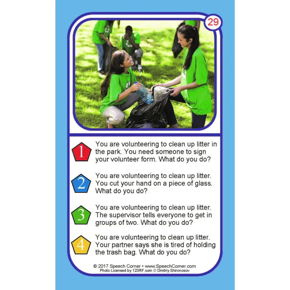 A printed speech practice card with a blue border, a photo of two girls in green shirts cleaning up litter in a park, and four numbered comprehension questions about volunteering.