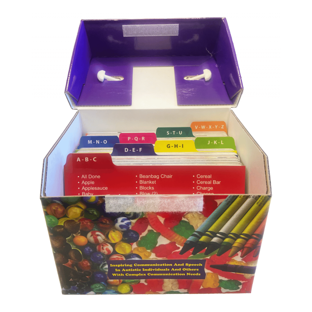 Open box containing colorful alphabet and number cards with a colorful design on the front.