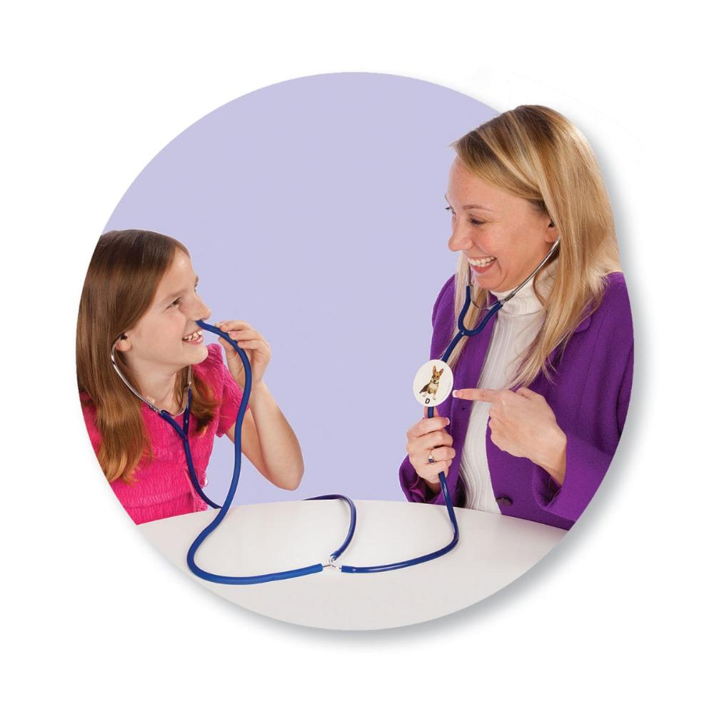 A young girl and her Speech Language Pathologist (SLP) using Oral & Nasal Listener™ in a speech therapy session