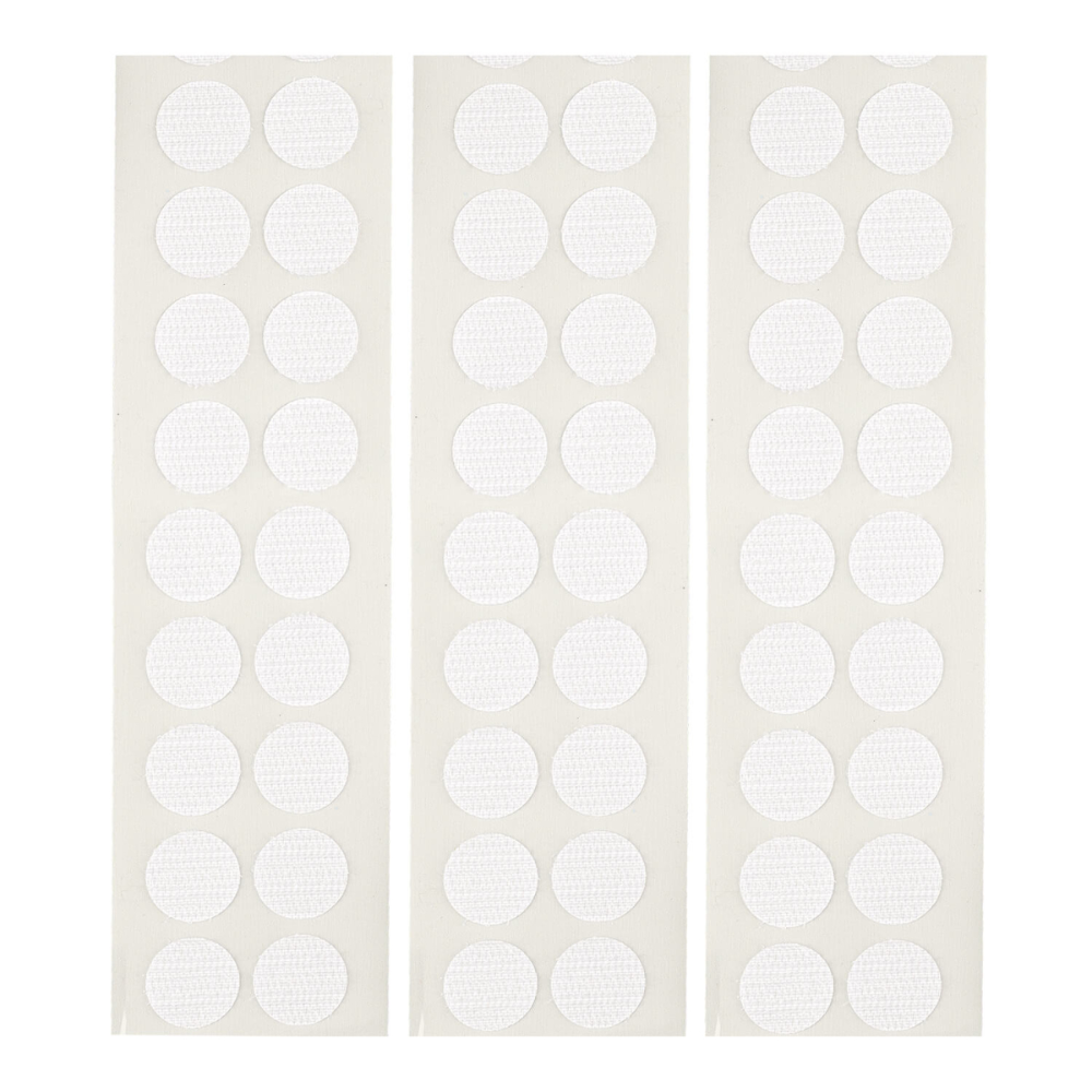 Three sheets of round adhesive velcro patches on a plain white background.