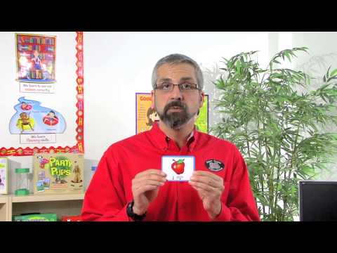 A Speech-Language Pathologist (SLP) demonstrating how to use the Syllable Drilling™ Card Deck by Super Duper